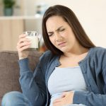 FIVE SYMPTOMS AND SIGNS OF LACTOSE INTOLERANCE-min
